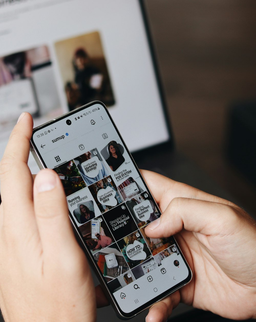 Creator checking her content on her phone